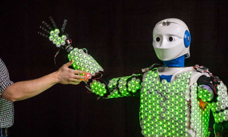 A highly performing and efficient e-skin for robotic applications