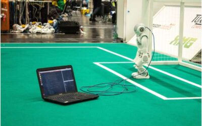 A Q-learning algorithm to generate shots for walking robots in soccer simulations