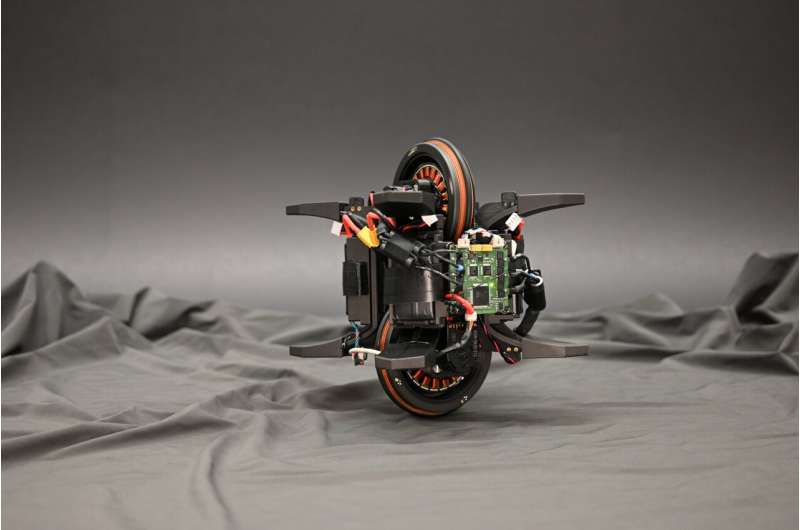 The Wheelbot: A symmetric unicycle with jumping reaction wheels